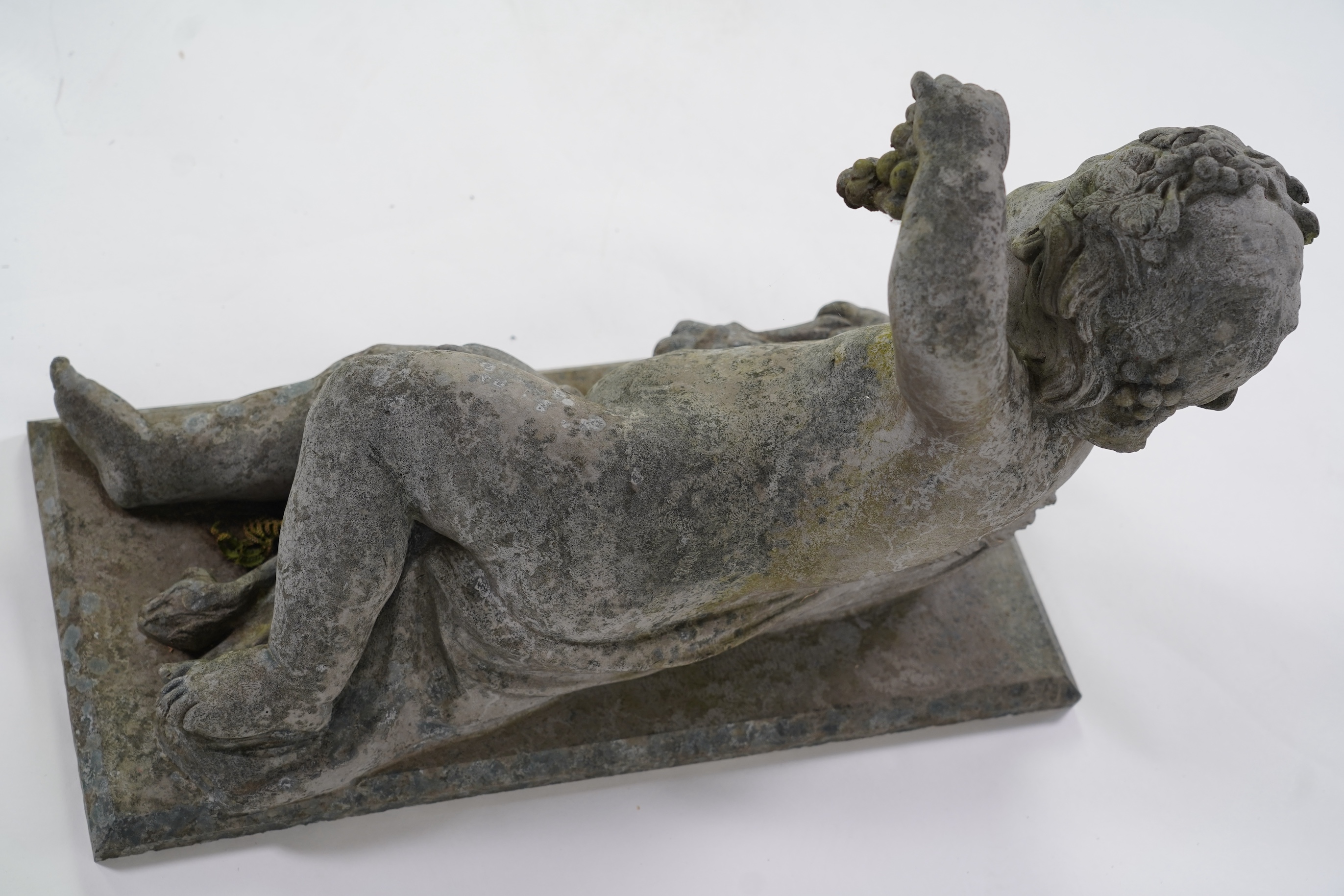 A pair of simulated lead garden sculptures, Emblematic of Summer and Autumn